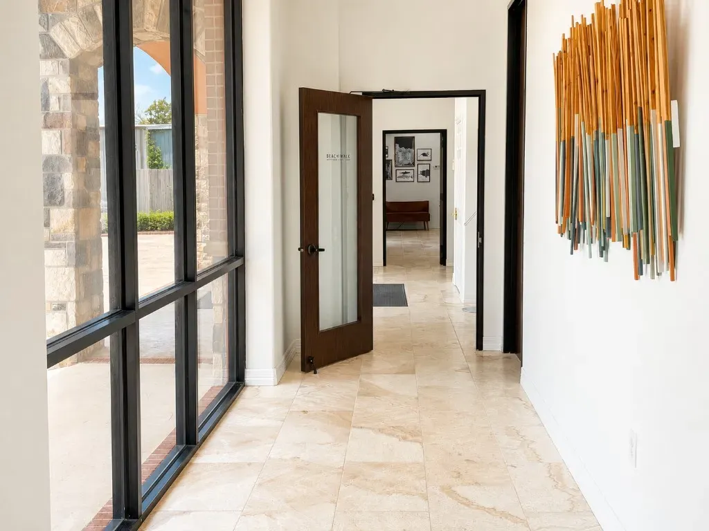 Professional entrance foyer with Beach Walk Office Suites branded door