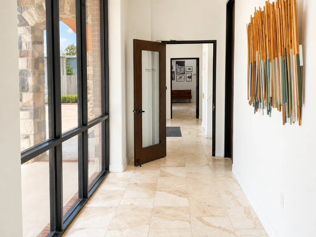 Professional entrance foyer with Beach Walk Office Suites branded door